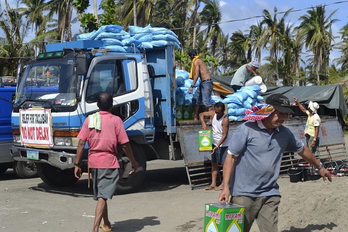 Unloading relief supplies in Leyte photo